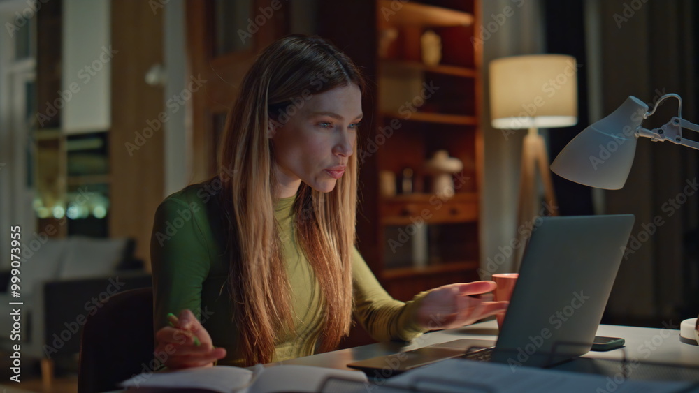 Woman coach consulting online at evening home closeup. Girl have work video call Woman coach consulting online at evening home closeup. Girl have work video call