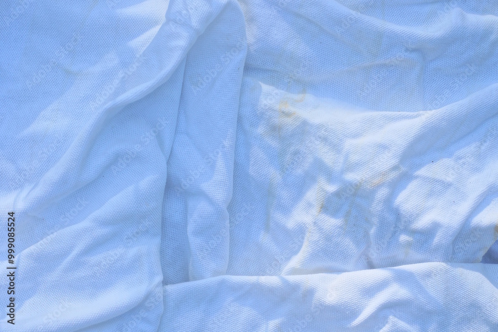 Obraz premium white fabric background of cloth from a piece of crumpled cloth
