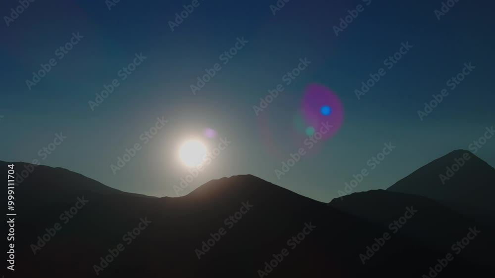 vista aéra do nascer do sol no deserto do atacama, com vulcão licamcabur ao fundo