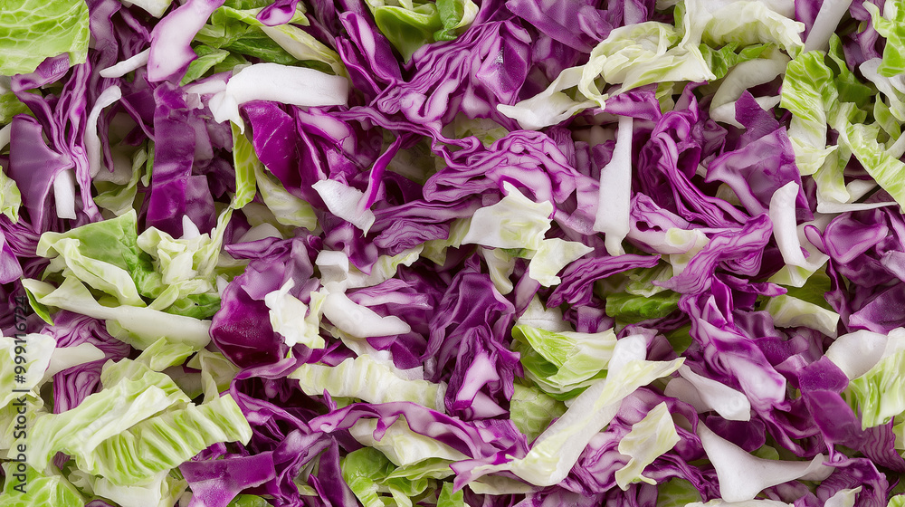 a close-up, top-down view of shredded cabbage spread across the entire frame, filling the image with its vibrant green and purple hues and crisp, delicate texture a close-up, top-down view of shredded cabbage spread across the entire frame, filling the image with its vibrant green and purple hues and crisp, delicate texture
