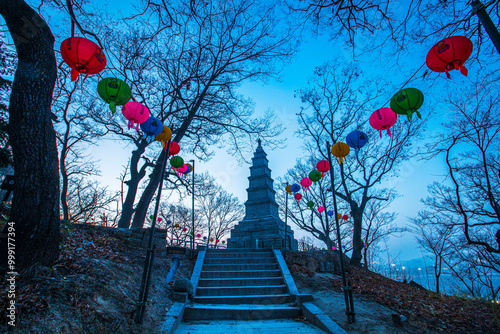 Icheon-si, Gyeonggi-do, South Korea - March 22, 2020: Dawn view of lotus lamps and Multi-Story Tower at Silleuksa Temple photo