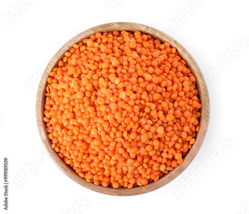 Raw lentils in bowl isolated on white, top view