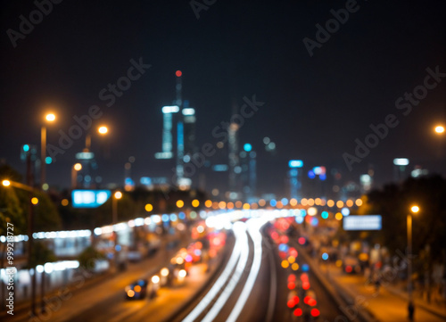 Bright glowing lights of district in megapolis under dusk sky in evening on blurred background photo