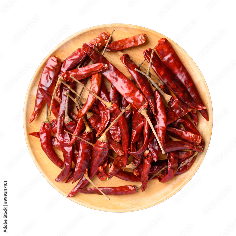 Dried red chili on wooden plate, Food ingredient, Top view Dried red chili on wooden plate, Food ingredient, Top view