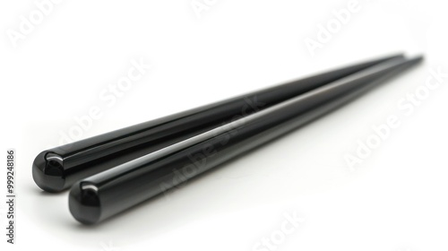 Pair of Black Chopsticks on White Background