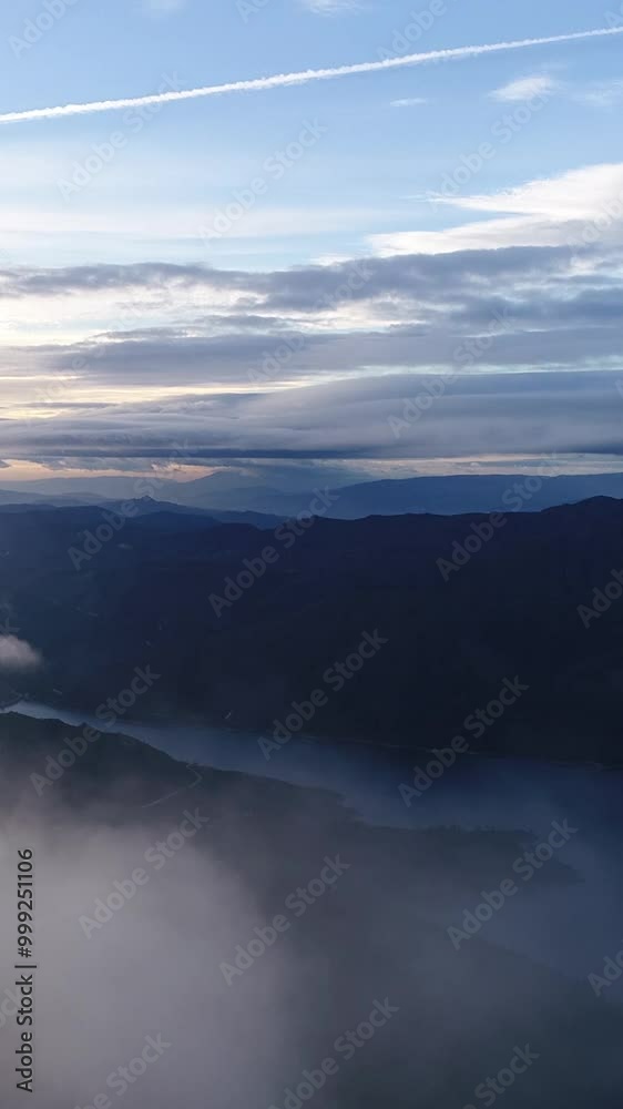 Flying Over Clouds Mountain Landscape Blue Sky Vertical video Flying Over Clouds Mountain Landscape Blue Sky Vertical video