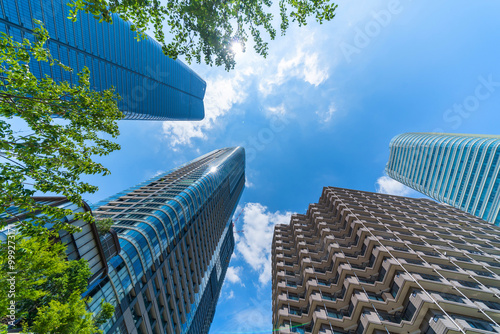 Photography looking up view of city skyline in tokyo, japan