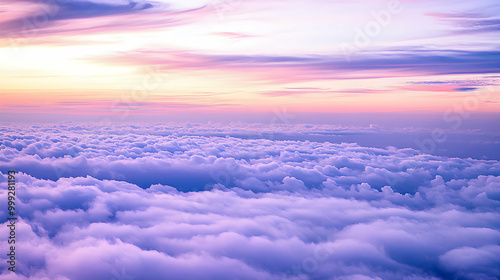 Aerial view of a beautiful sunset over a sea of clouds.