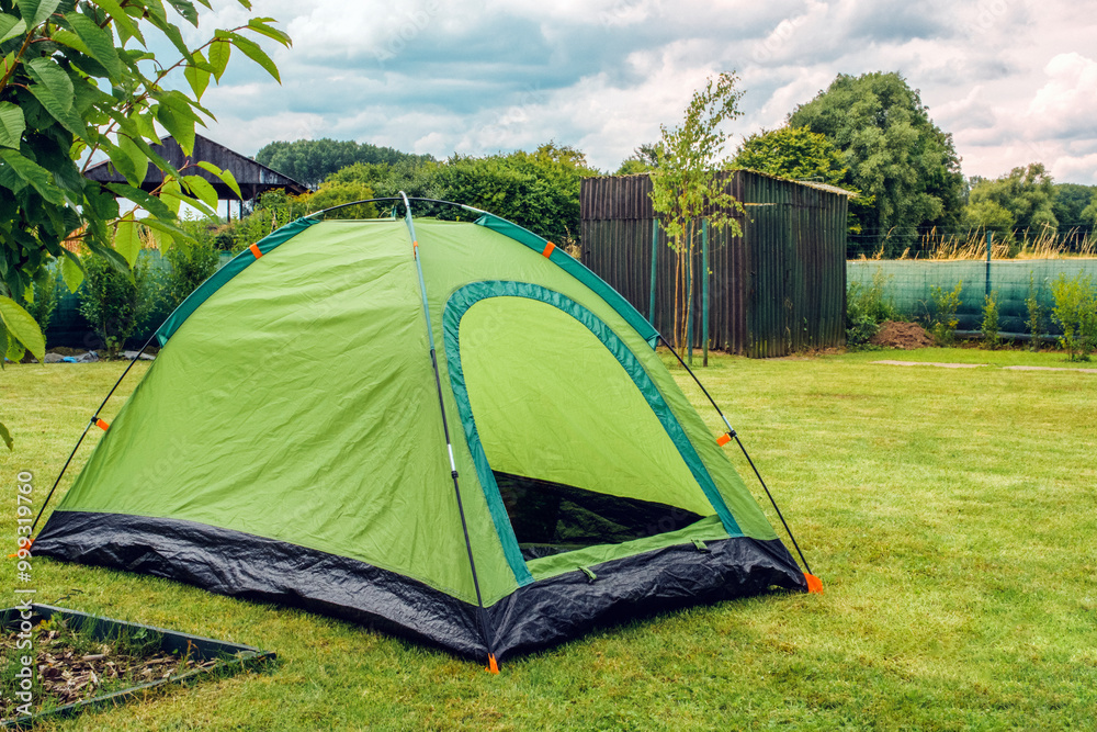 Tent set up on the lawn near the house Tent set up on the lawn near the house