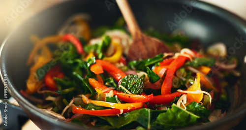Tableau sur toile Food, kitchen and spoon in pan for cooking with health, fresh ingredients and wellness with recipe for lunch