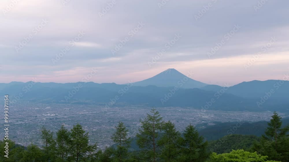 Mt. Fuji over Cities in the Kofu Basin Captured from Mt. Amari (Day-to-Night Timelapse | Panning) Mt. Fuji over Cities in the Kofu Basin Captured from Mt. Amari (Day-to-Night Timelapse | Panning)