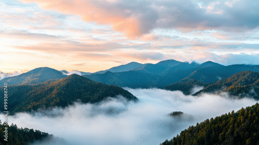 misty mountain range at sunrise, enveloped in soft pink clouds and surrounded by lush greenery, creates serene and tranquil atmosphere