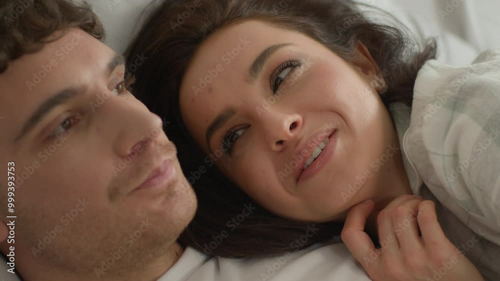 Close up happy faces couple boyfriend girlfriend talking chatting gossip laughing smiling cuddle female male love relationship bonding joyful glad bedroom home beloved romance together sweetheart cozy