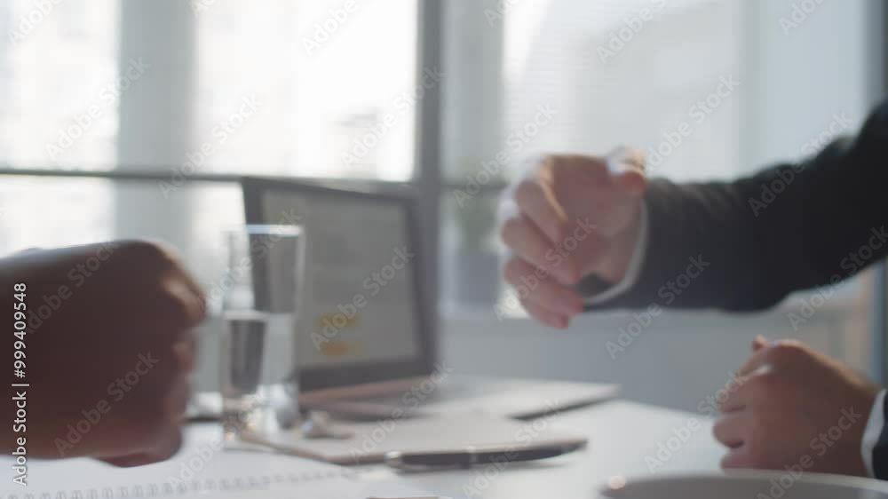 Close up of handshake of two multiethnic businessmen Close up of handshake of two multiethnic businessmen