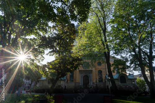 Photography The Hedvig Eleonora F�rsamling church through the trees in Stockholm, Sweden