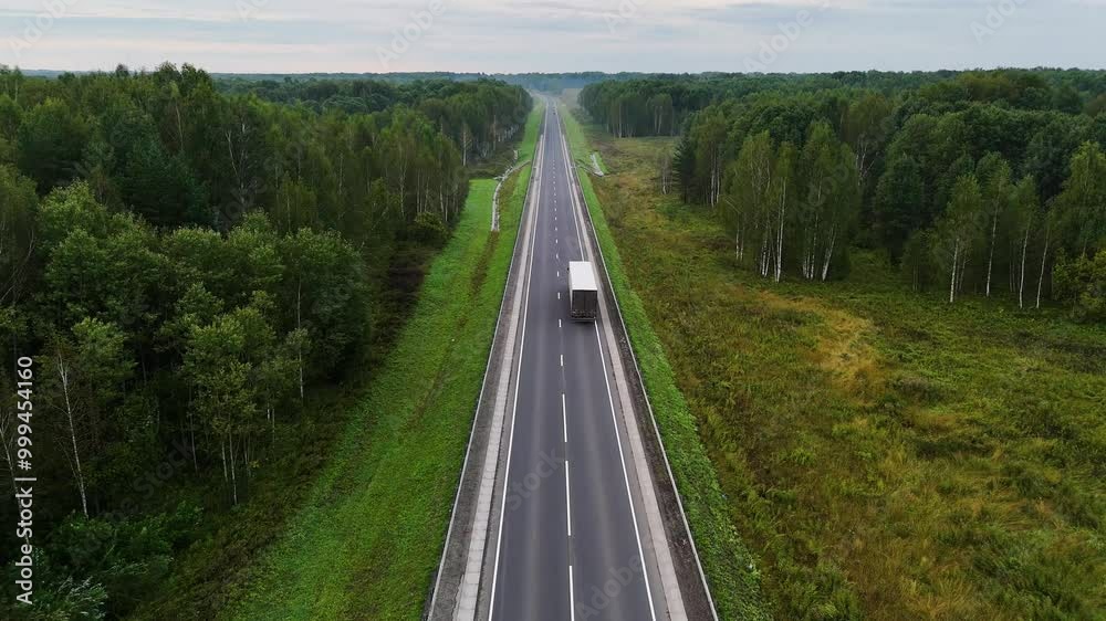 The car is driving along the road The car is driving along the road