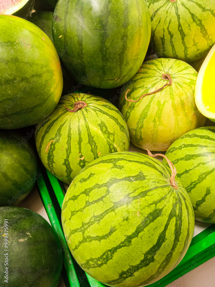 pile of fresh watermelons in the supermarket pile of fresh watermelons in the supermarket