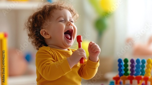 Happy toddler playing with colorful toys in a bright, cheerful environment.