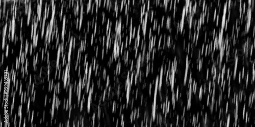 rain on a black background. Rain on black. Vector rain texture. Abstract background. electric ground wire. white dotted lines of lights on a black background.