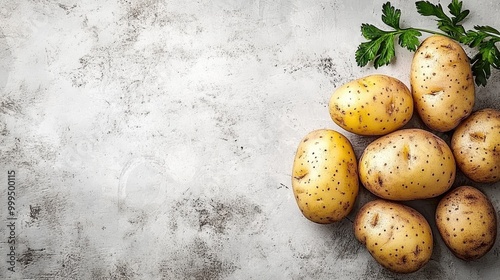 Whole washed organic floury potatoes on a neutral background A concept showcasing healthy vegetarian cuisine