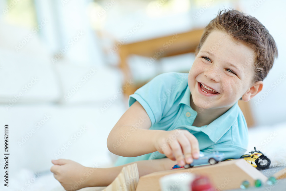 Toys, cars or child laughing with toys for learning, development and fun with smile. Excited, boy or happy kid enjoying games with plastic vehicle for childhood hobby or growth at house in England Toys, cars or child laughing with toys for learning, development and fun with smile. Excited, boy or happy kid enjoying games with plastic vehicle for childhood hobby or growth at house in England