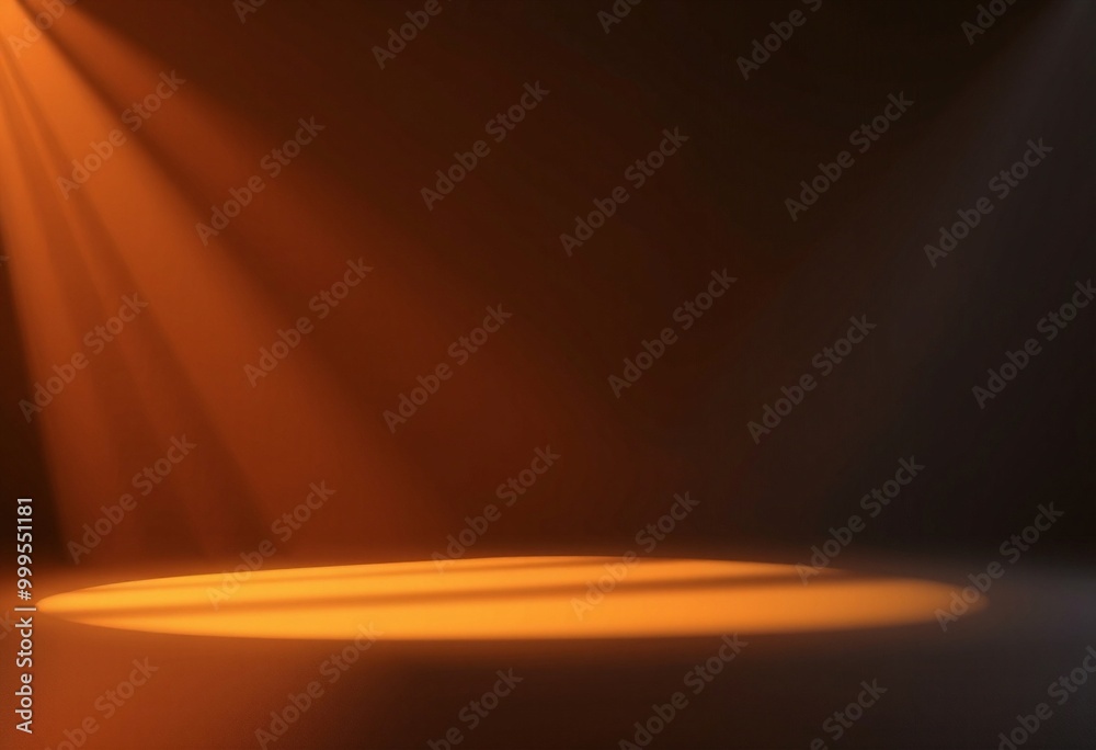 Orange spotlight shining on a dark surface.
