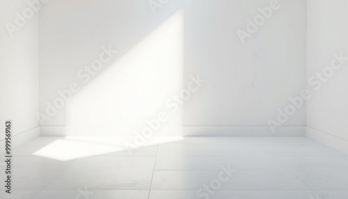 Sunlight shining through a window in a white room.