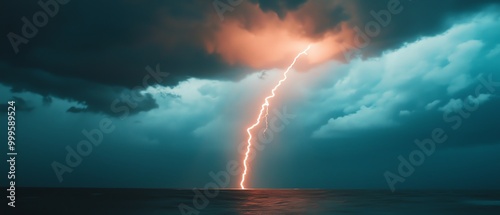 A dramatic lightning strike illuminates dark clouds over the ocean, showcasing nature's raw energy and beauty during a storm.