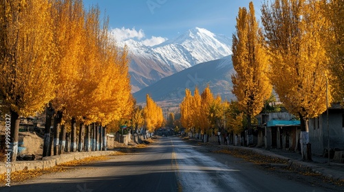 Autumn in Kashmir, with golden Chinar trees lining the streets, and snow-capped peaks visible beyond the horizon. photo