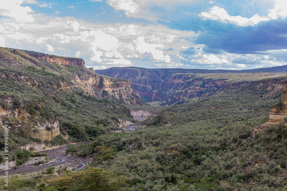 Naklejka premium Hell's Gate National Park is a national park situated near Lake Naivasha in Kenya. The park is named after a narrow break in the cliffs, once a tributary of a prehistoric lake that fed early humans in