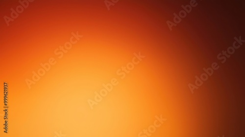 A smooth gradient of warm orange tones, creating a soft and inviting ambient background. photo