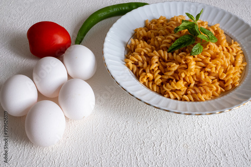 pasta with tomato sauce and egg