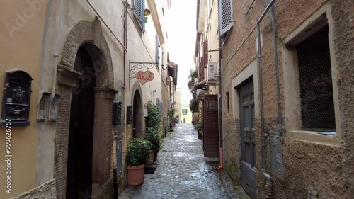 Pov City street in Castel Gandolfo village a beautiful travel destination on the slopes  of Lake Albano and its beautiful nature, suggestive walking in ancient and pittoresque alley