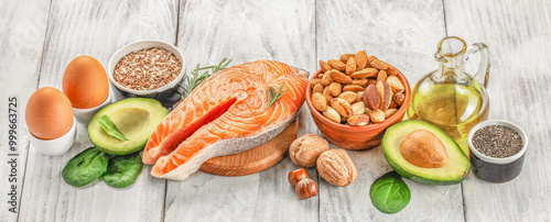 Fotografie Food sources of omega 3 and healthy fats on a wooden background