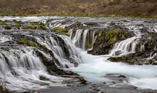 wide cascade over the lava stones, Brúarfoss, Iceland
