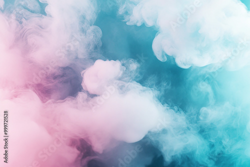 Dreamy pastel teal and pink smoke on abstract background. Cloud and fog. Glowing color steam