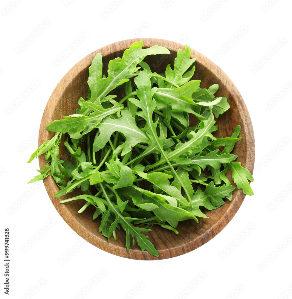 Fresh arugula leaves in bowl isolated on white, top view Fresh arugula leaves in bowl isolated on white, top view