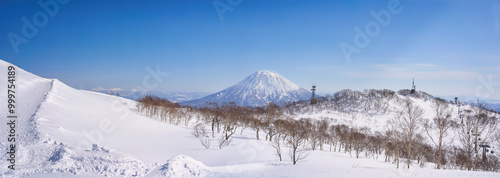 Panorama landscape of Niseko view on the mountain and yotei mountain in background photo