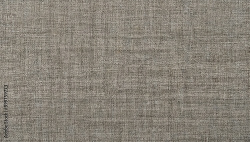 Textured fabric surface in neutral grey tones, ideal for home decor, upholstery projects, and creative textile applications