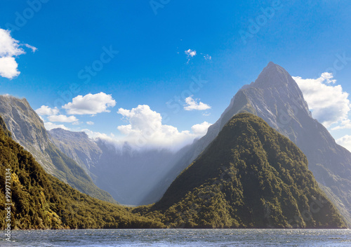 view to the Milford Sound and Mitre Peak in Fjordland National Park, Southern Alps, New Zealand photo