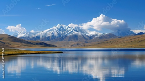 Majestic Snow Mountain and Plateau Lake: A Breathtaking Natural Wonder. Admire the Grandeur and Serenity.