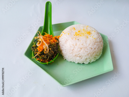 Urap Sayur. healthy and traditional indonesian food isolated on white photo