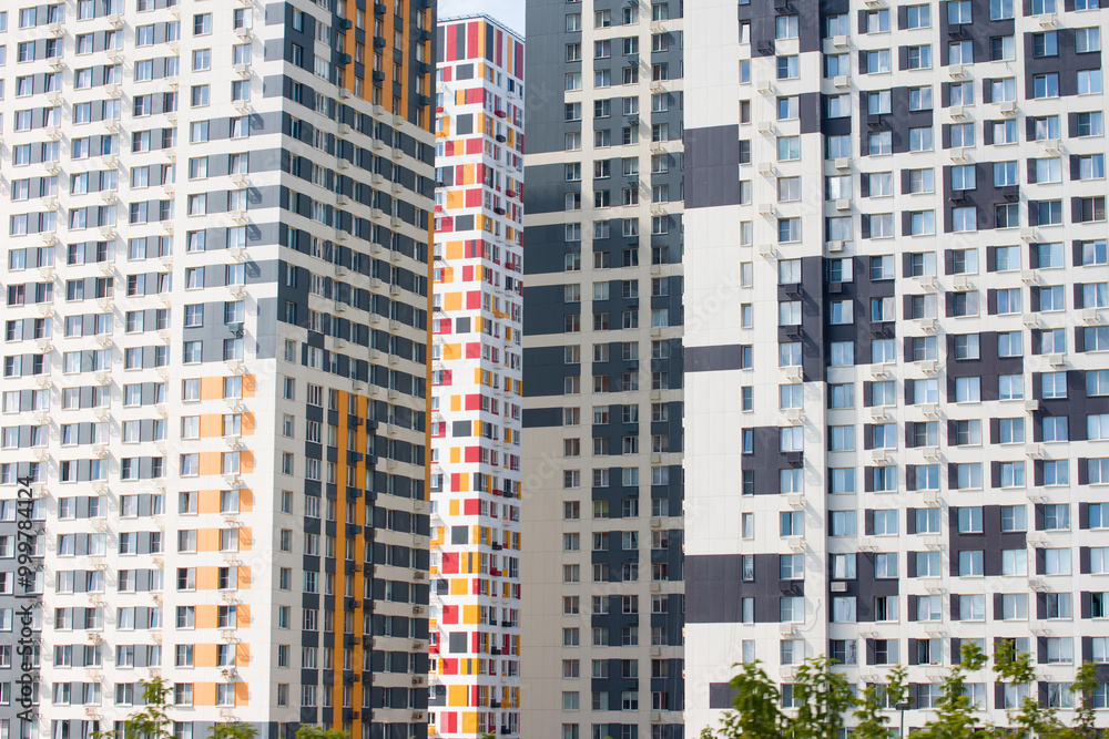 Naklejka premium A modern residential quarter with fashionable bright houses. Real estate, new buildings