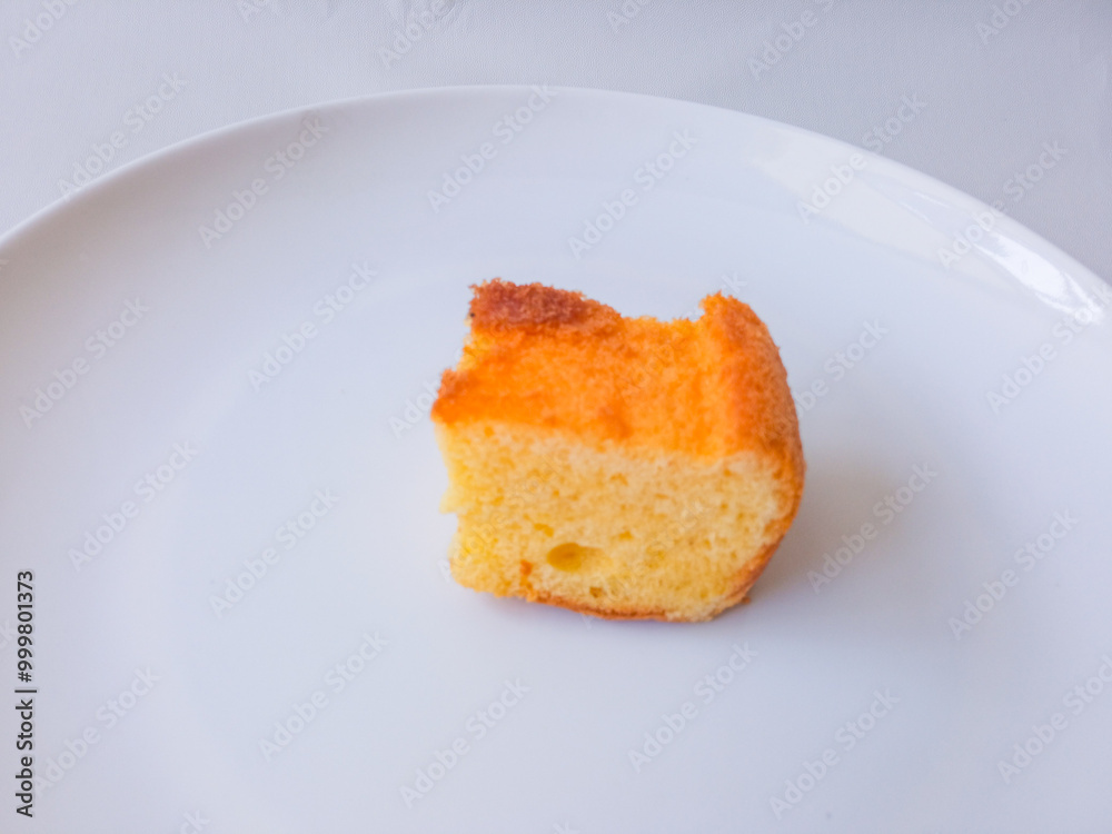 Pieces of tasty lemon cake with isolated on white Pieces of tasty lemon cake with isolated on white