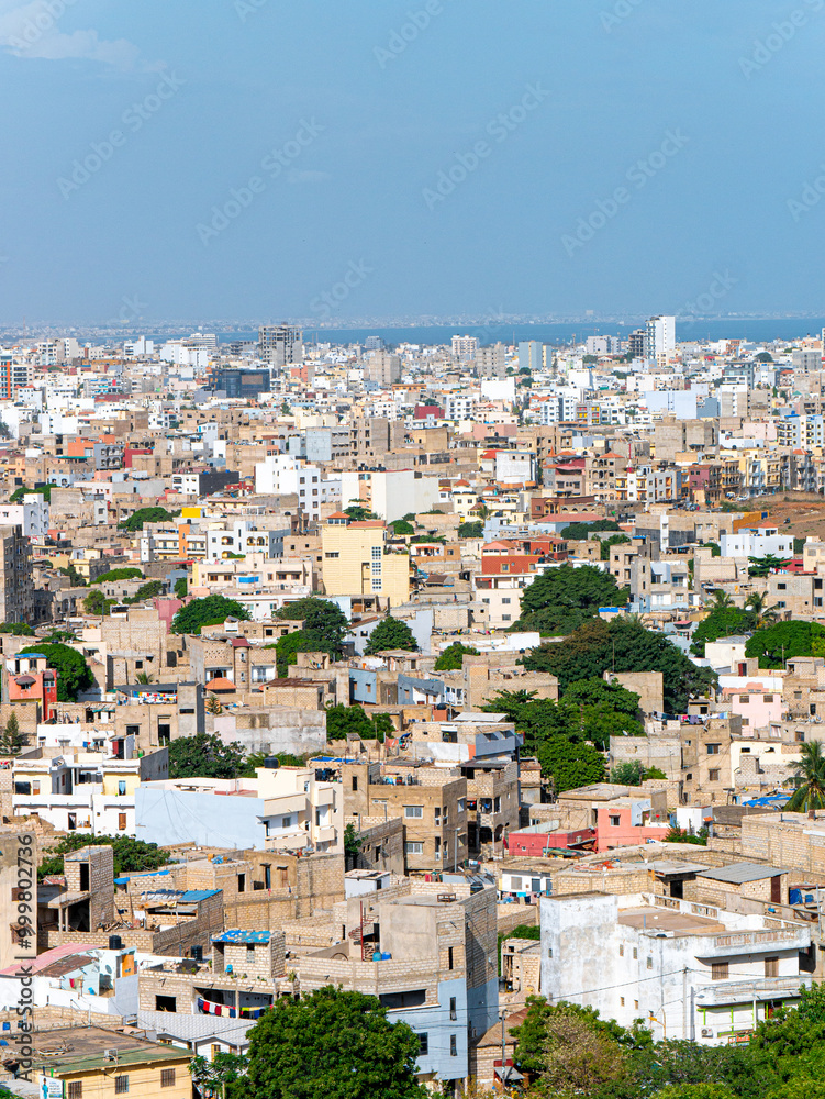 Dense cityscape of Dakar, Senegal on a sunny afternoon - Portrait shot Dense cityscape of Dakar, Senegal on a sunny afternoon - Portrait shot