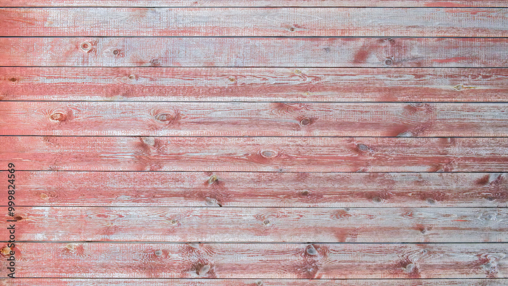 A wooden wall with a grainy texture. The wood is red and has a natural look. The wall is empty and has no furniture or decorations