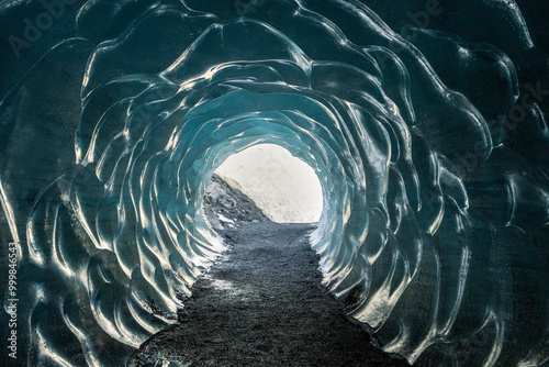 The ice cave walls carved with natural wave like patterns, Katla Ice Cave, Iceland, 