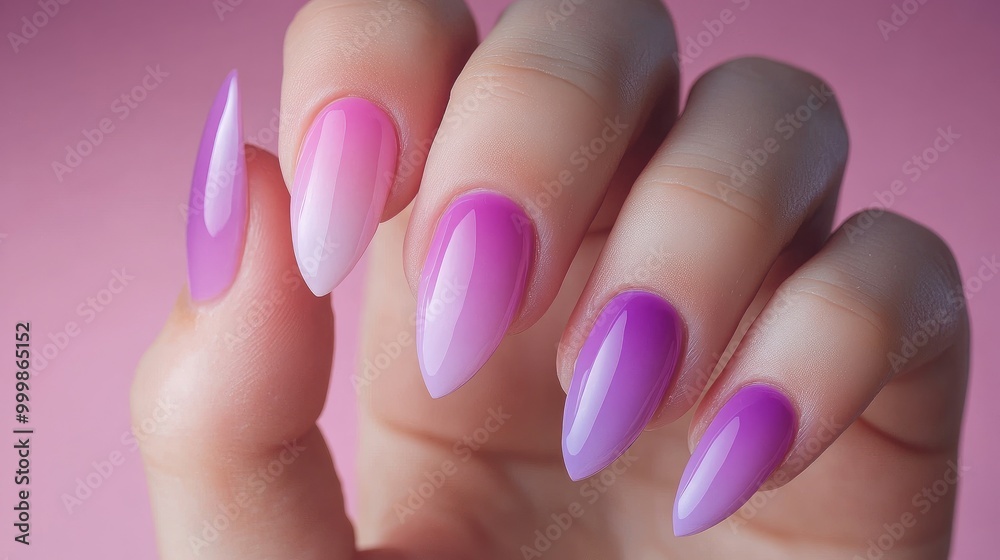 Detailed shot of gradient pink and purple gel nails on a mannequin's hand, no branding, focus on the smooth color blend, no people. Detailed shot of gradient pink and purple gel nails on a mannequin's hand, no branding, focus on the smooth color blend, no people.