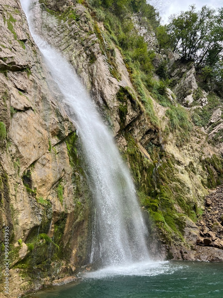 Fototapeta premium Gregorčičev waterfall or Volarja waterfall (Vrsno, Slovenia) - Gregorcic-Wasserfall oder Gregorcicfall (Vrsno, Slowenien) - Gregorčičev slap ali Simonov slap (Vrsno, Slovenija)