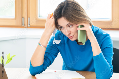 Close up of shocked woman sitting at the table, stressed and confused by calculate expense from invoice or bills, have no money to pay mortgage or loan. High prices and spending money concept